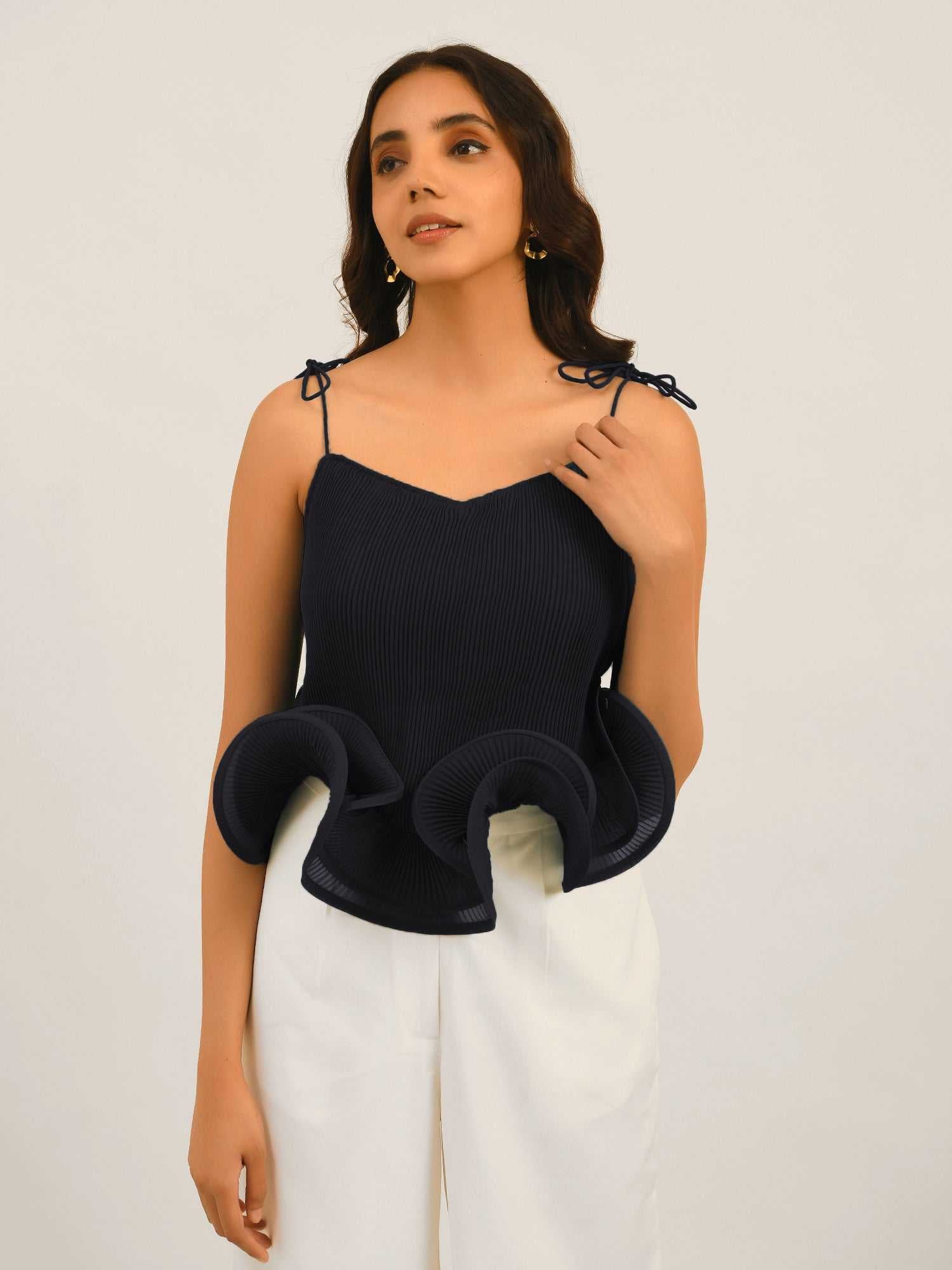 resort vacay top with dramatic hem ruffle