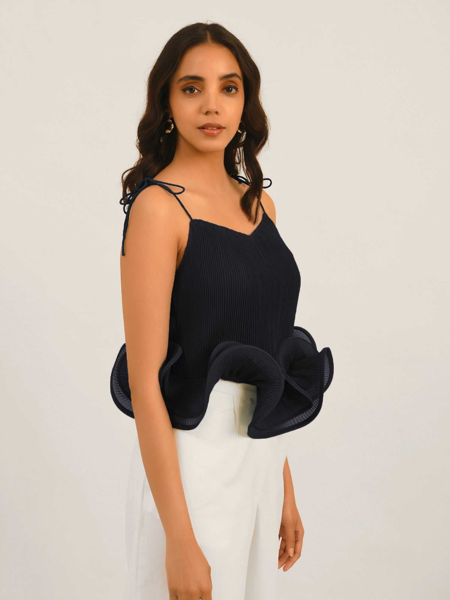 resort vacay top with dramatic hem ruffle