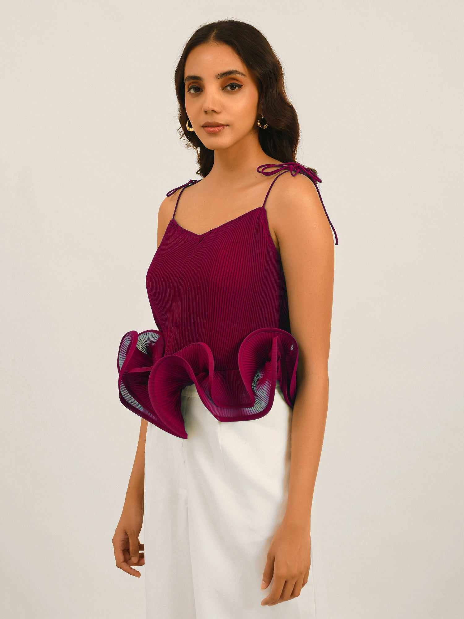 resort vacay top with dramatic hem ruffle