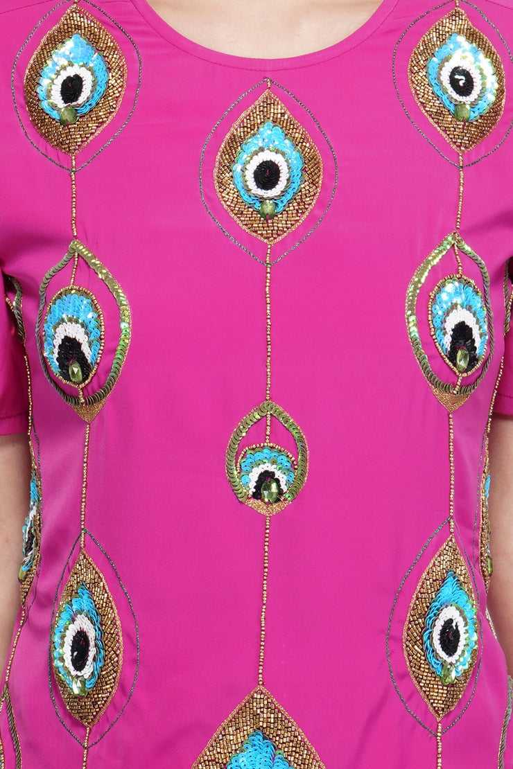 peacock motif magenta top
