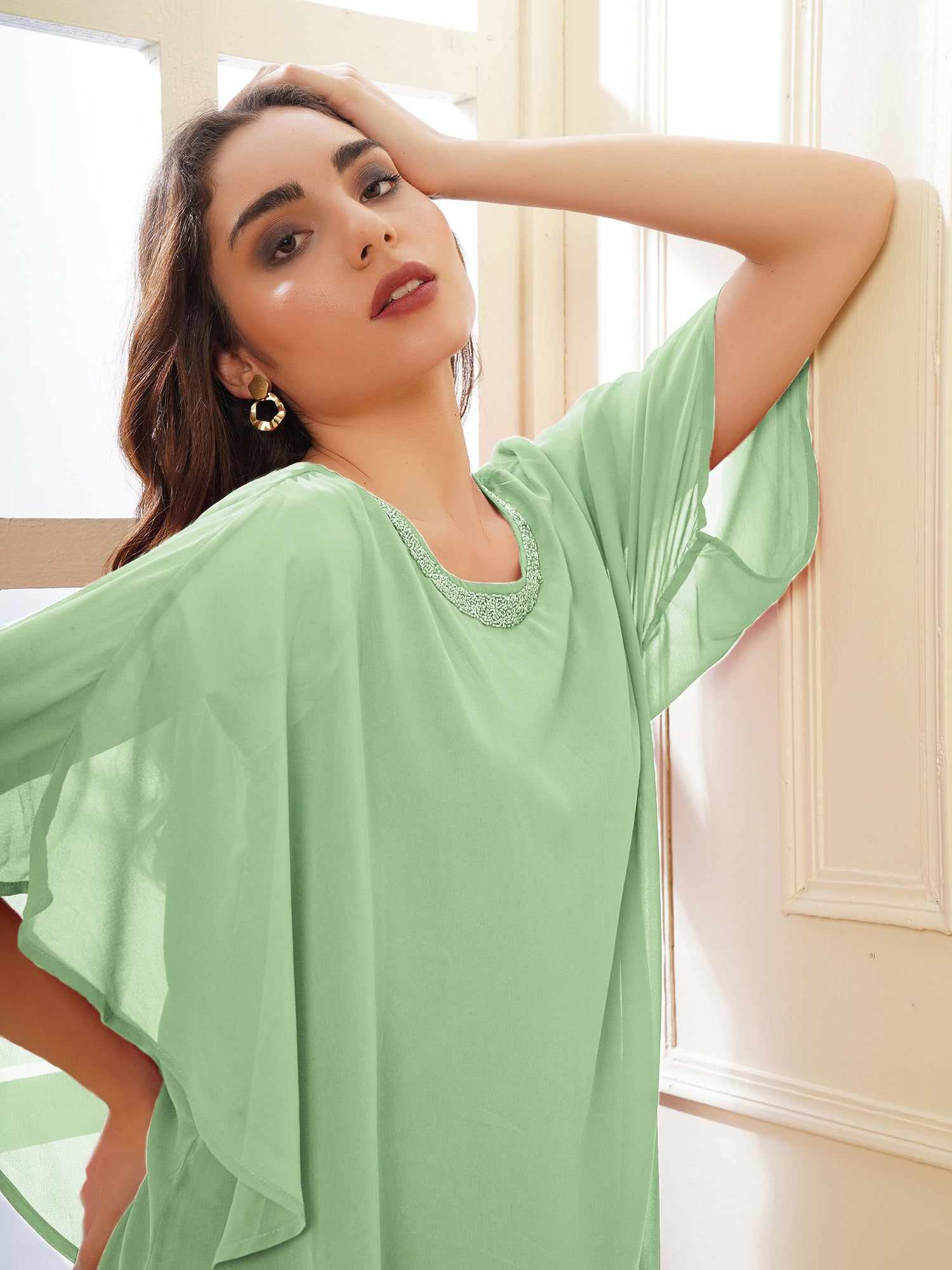 popover green dress with neck embellishment