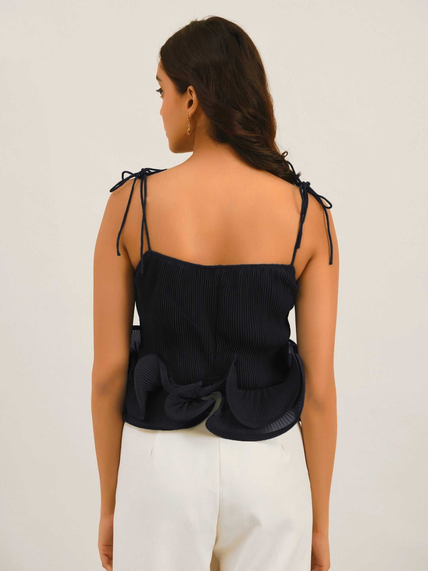 resort vacay top with dramatic hem ruffle