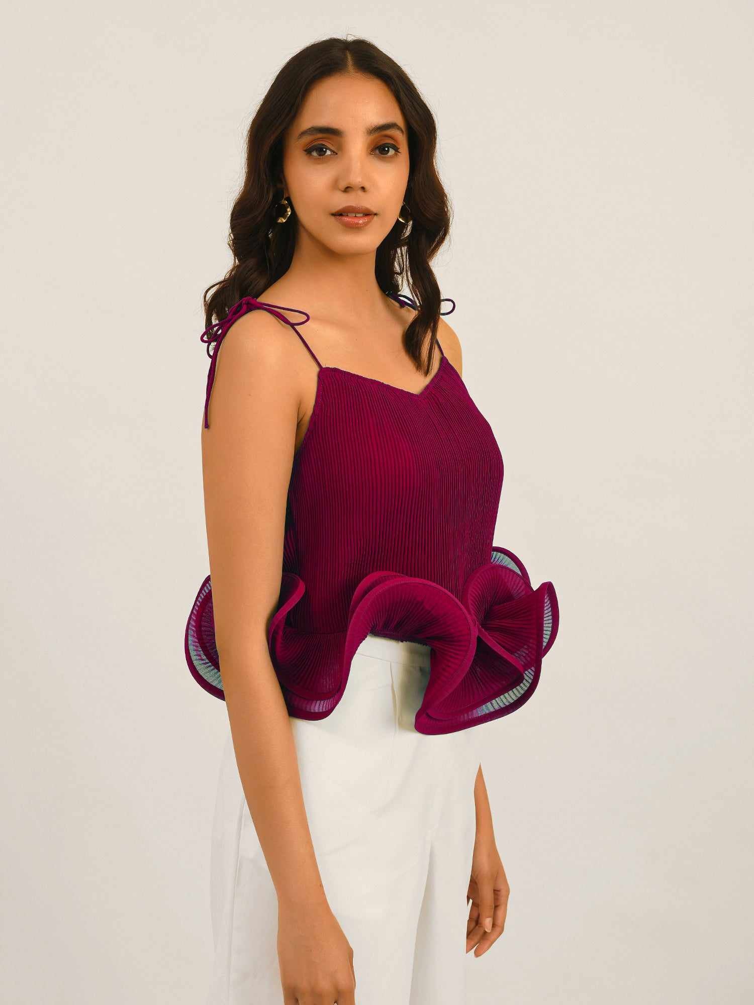 resort vacay top with dramatic hem ruffle