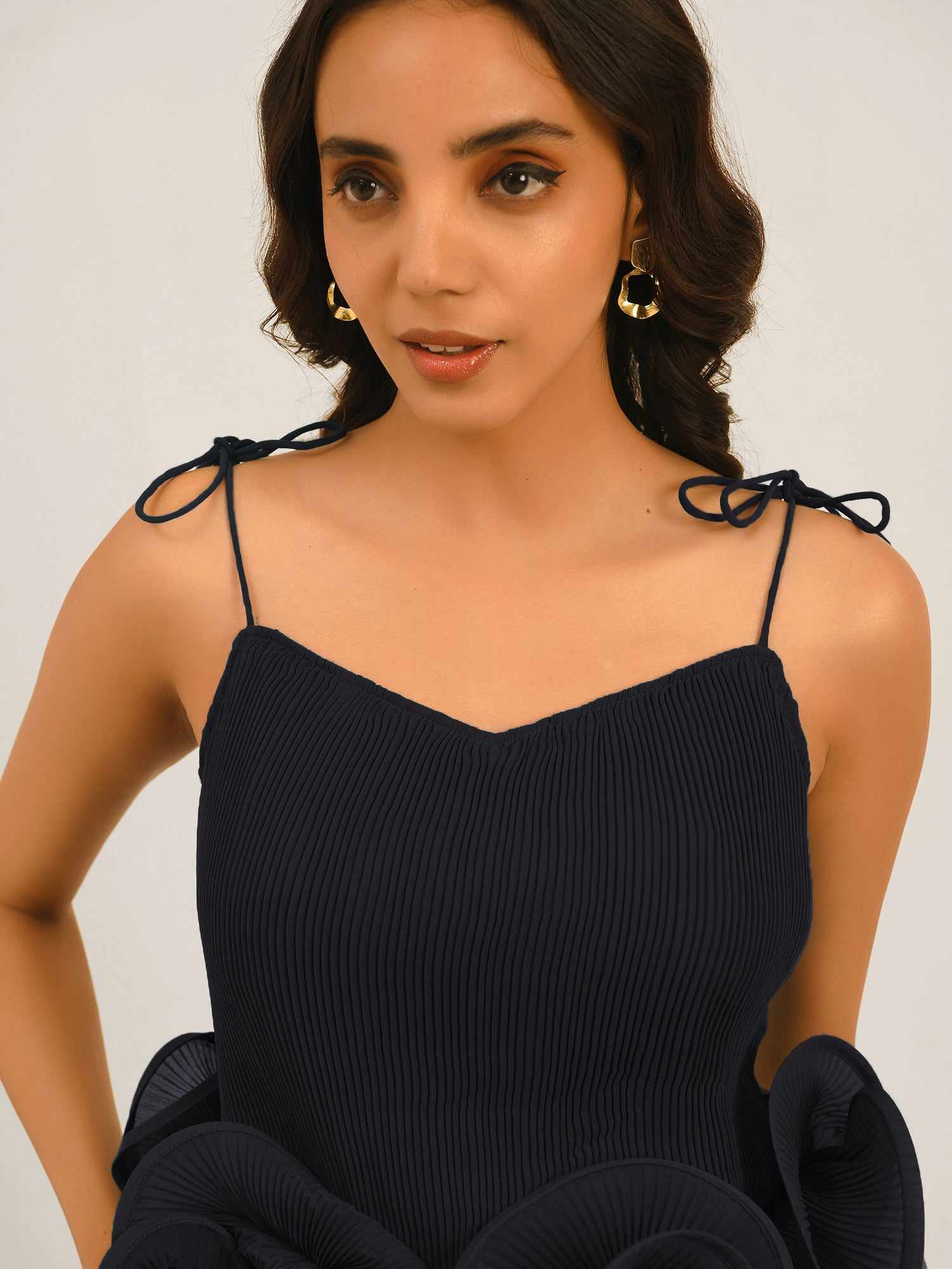 resort vacay top with dramatic hem ruffle