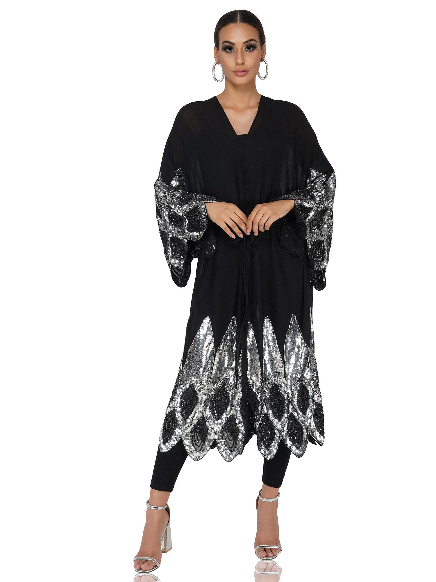 Attic Salt Long shrug with silver sequin design at hem and bottom