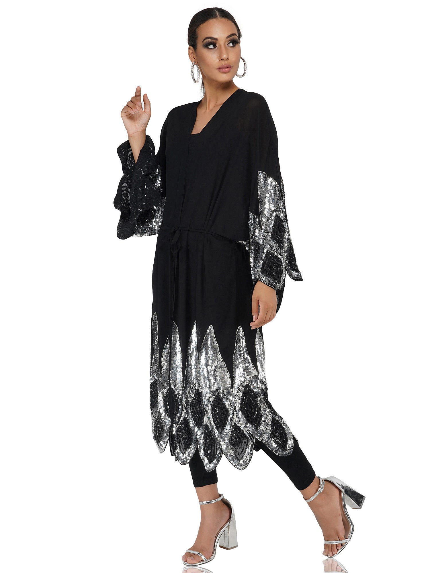 Attic Salt Long shrug with silver sequin design at hem and bottom