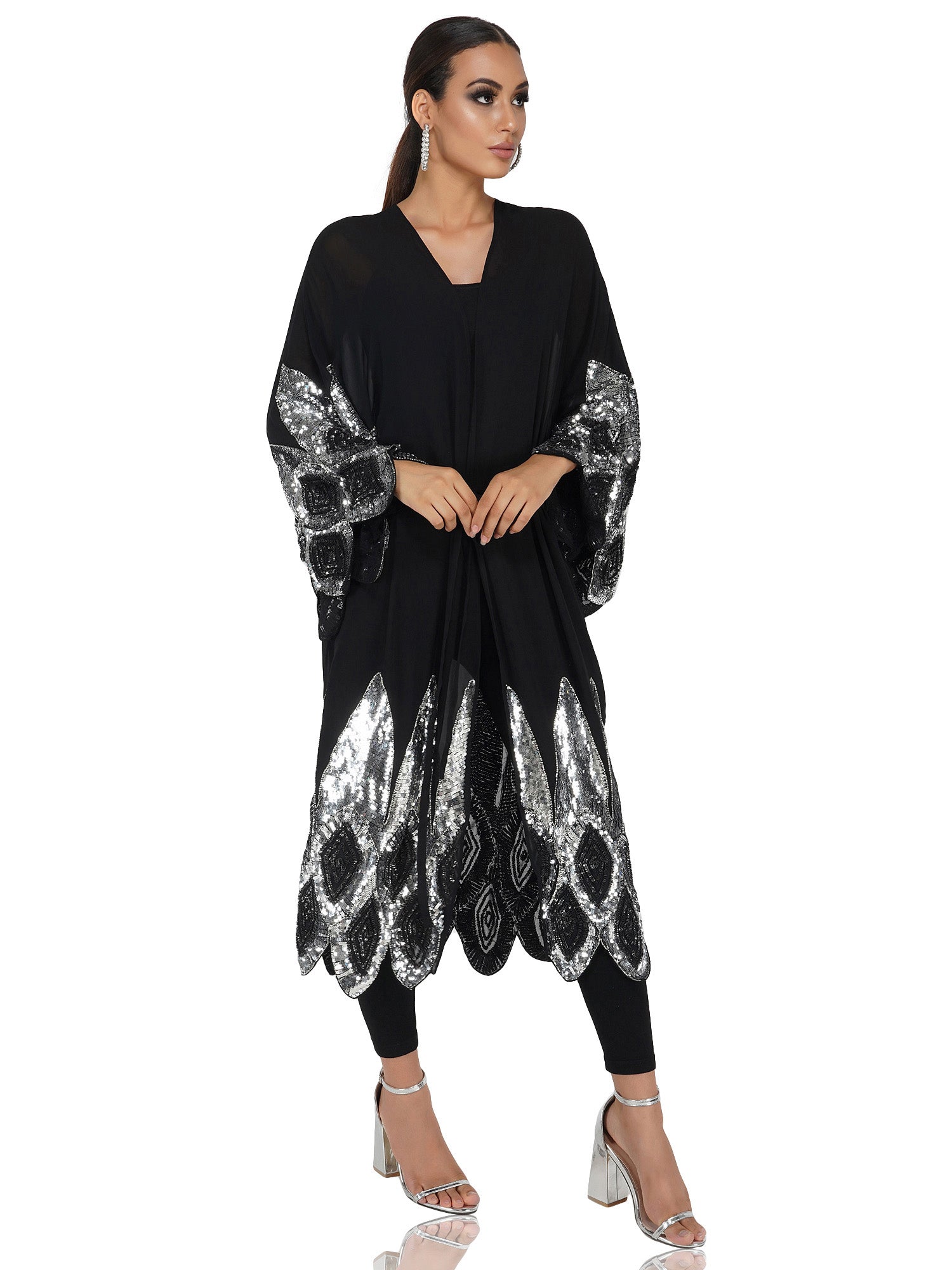 Attic Salt Long shrug with silver sequin design at hem and bottom