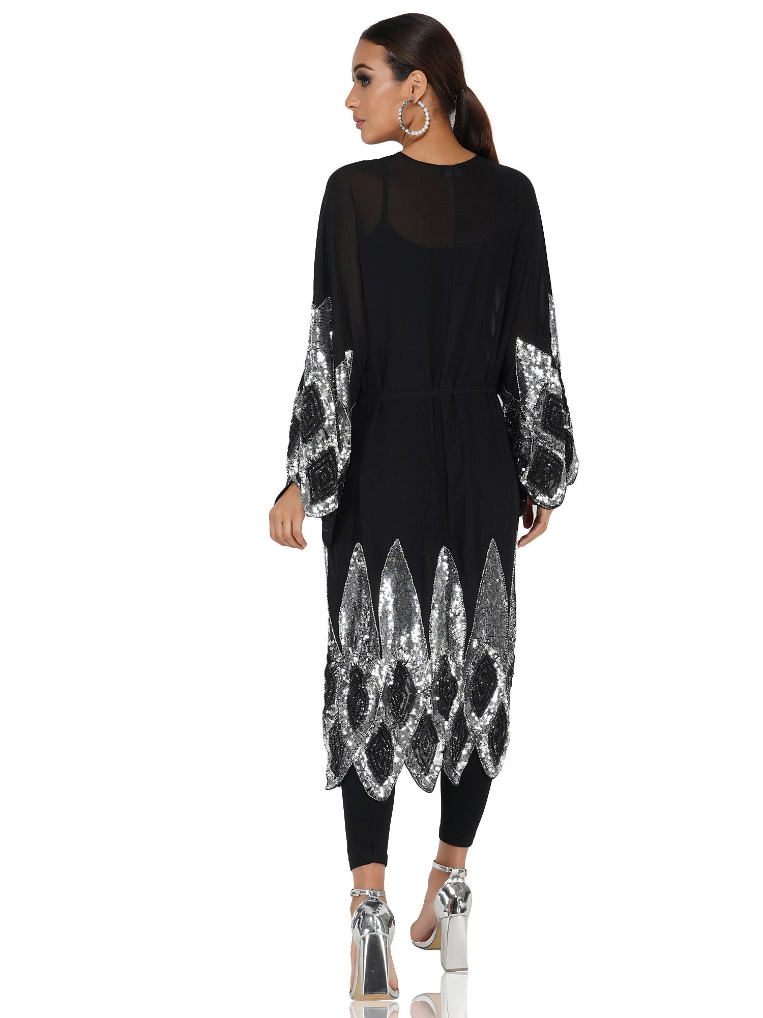 Attic Salt Long shrug with silver sequin design at hem and bottom