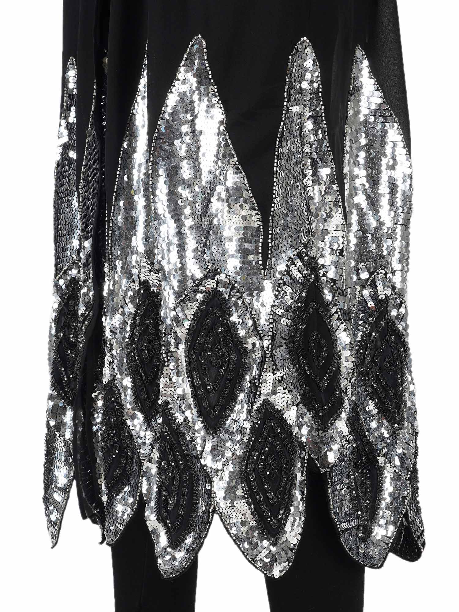 Attic Salt Long shrug with silver sequin design at hem and bottom