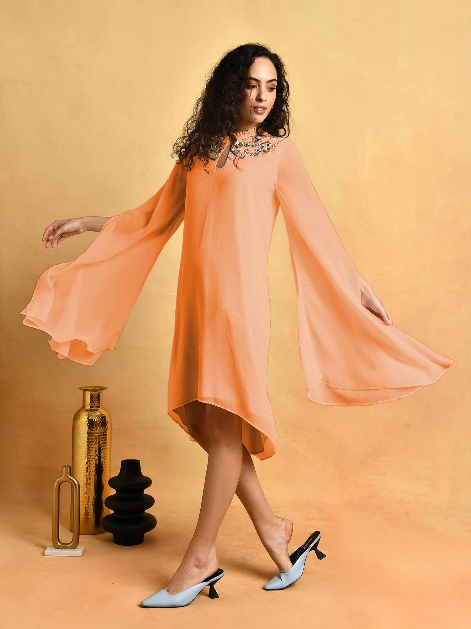 hand ornamented light orange cape dress
