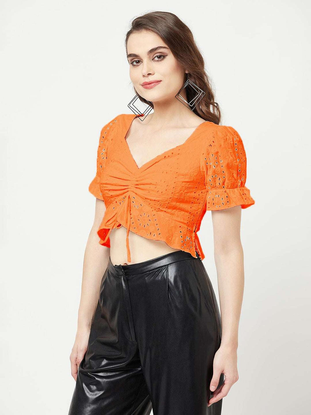 orange schiffli top with front ruche