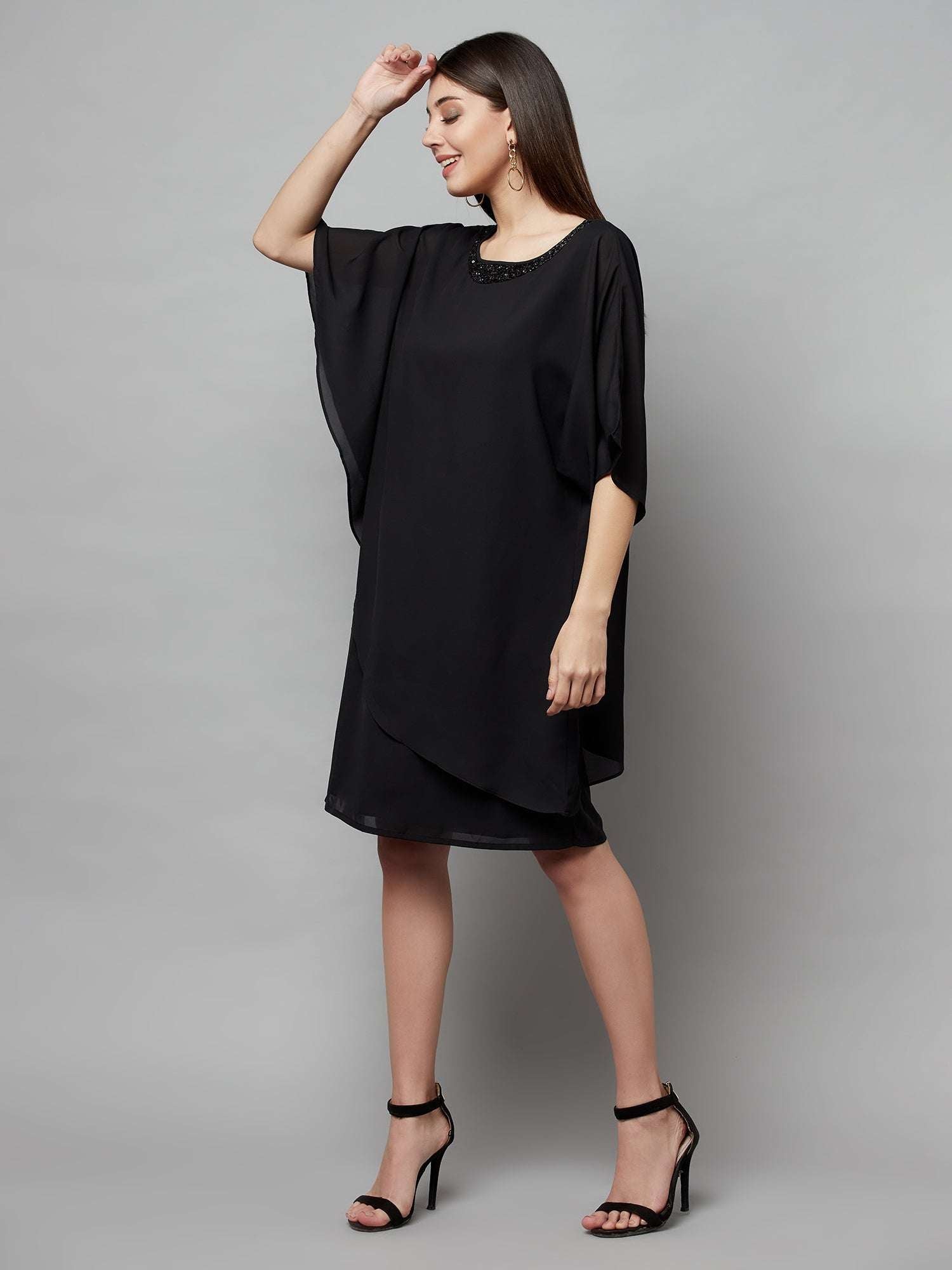 popover black dress with neck embellishment