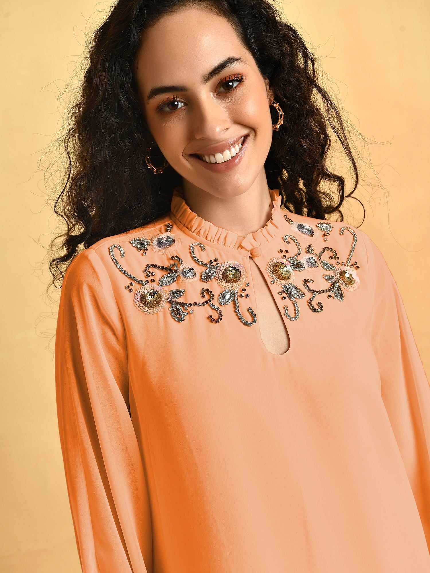 hand ornamented light orange cape dress
