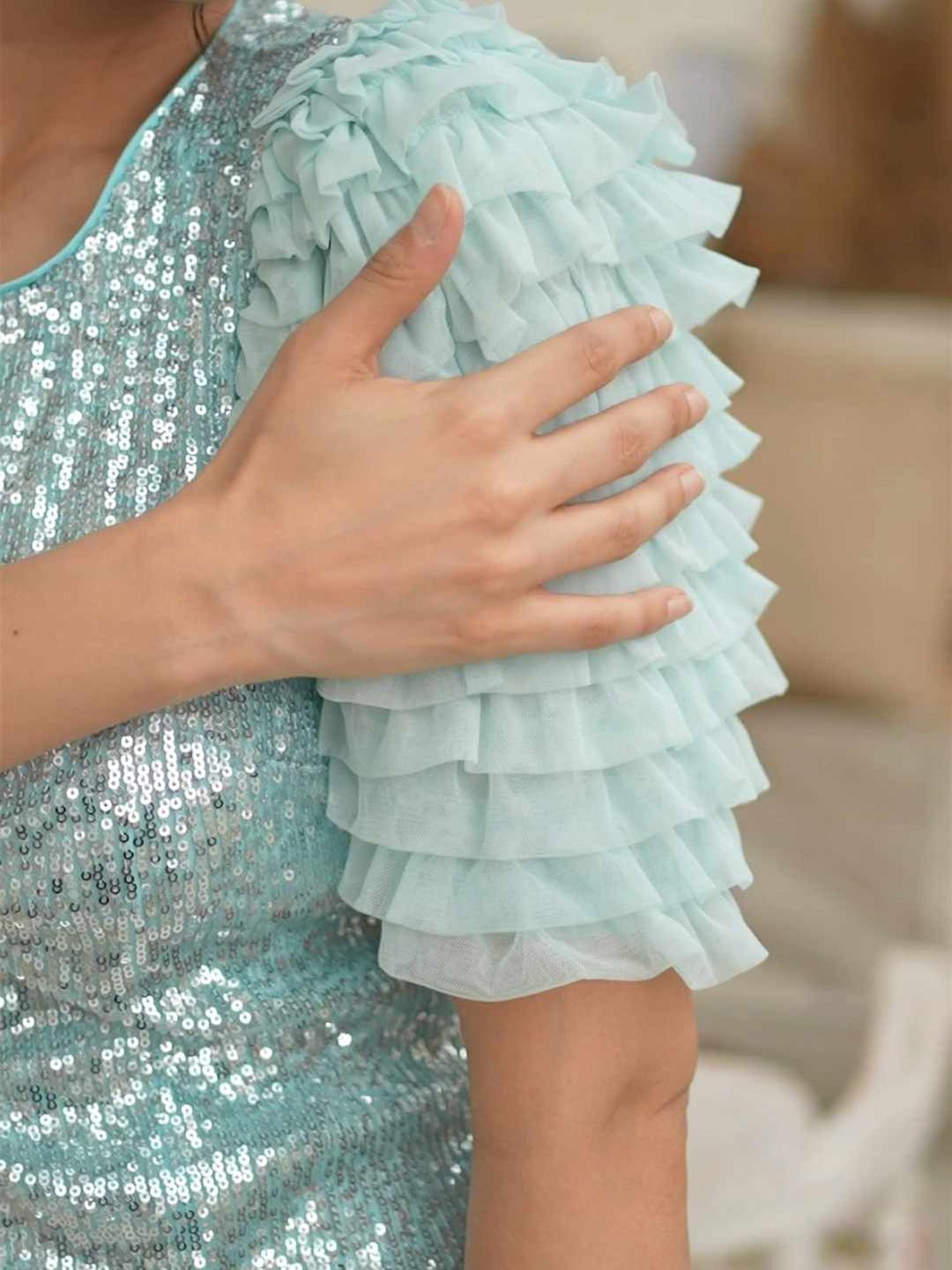 blue dramatic sleeve ruffle dress