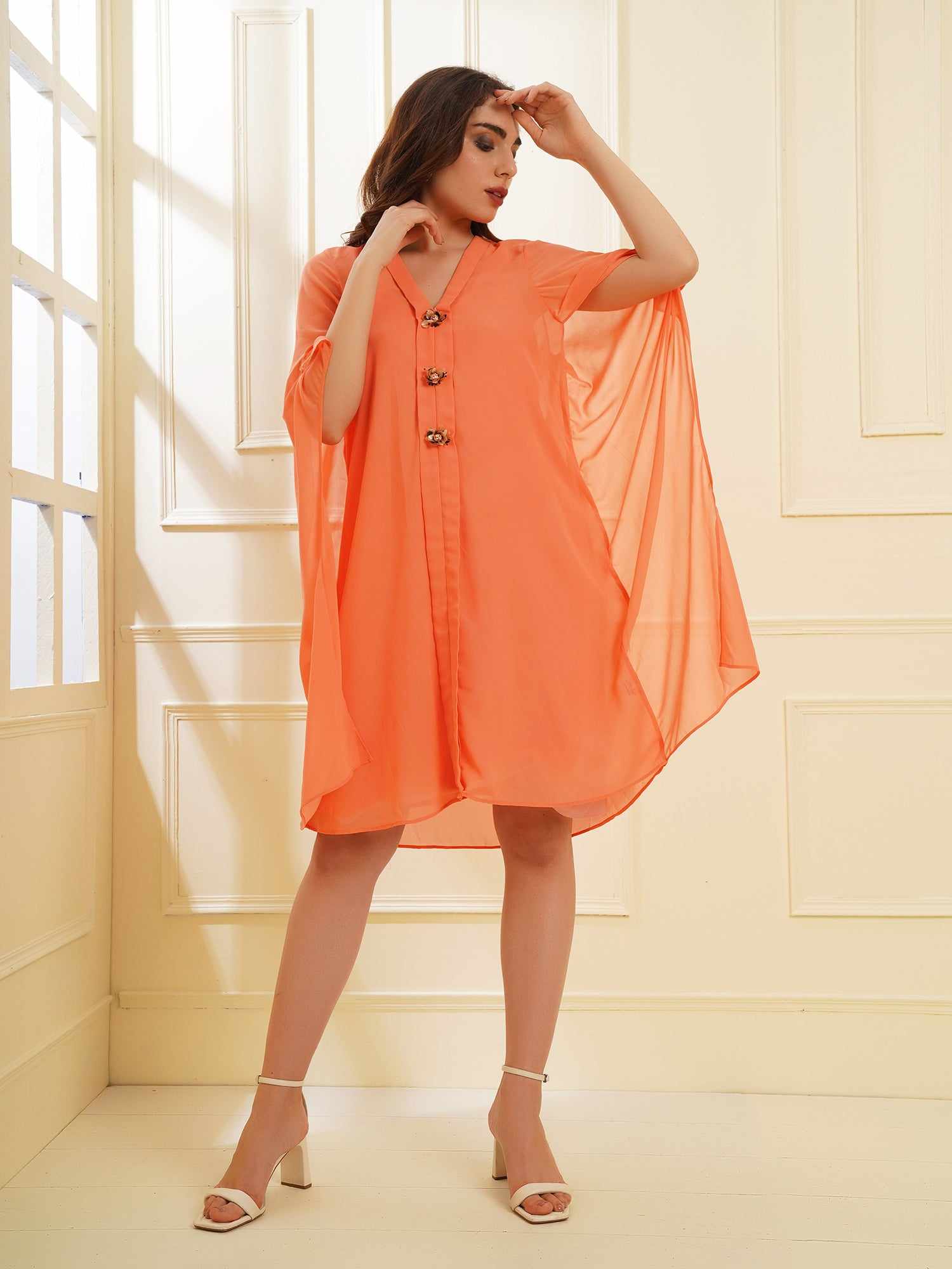 orange dress with placket embellishment