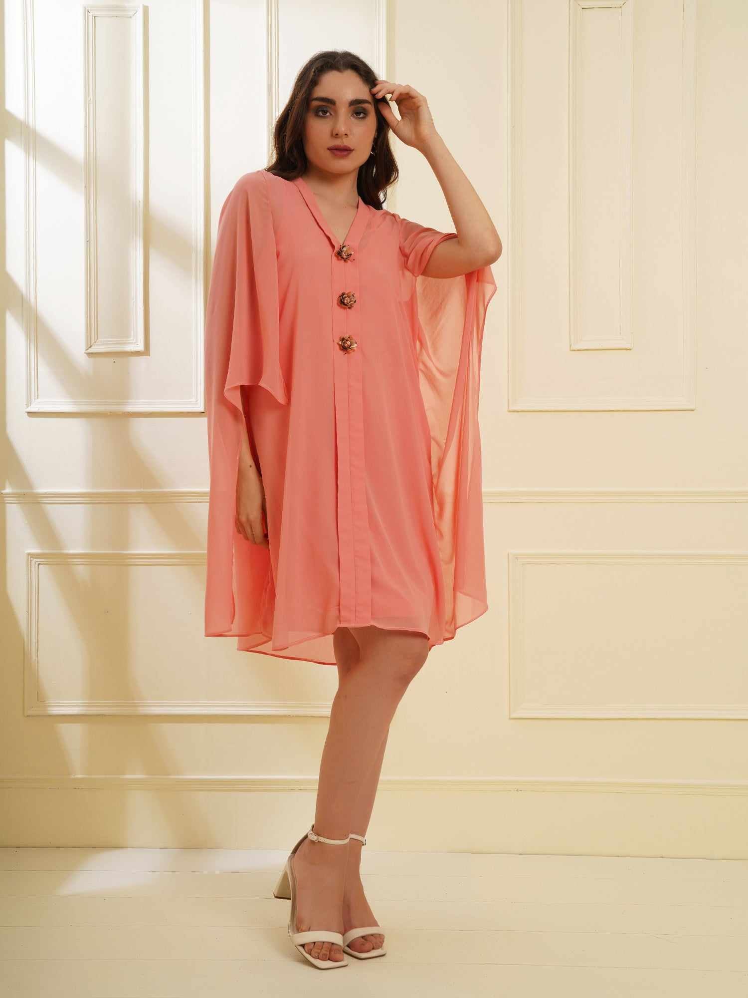 peach dress with placket embellishment