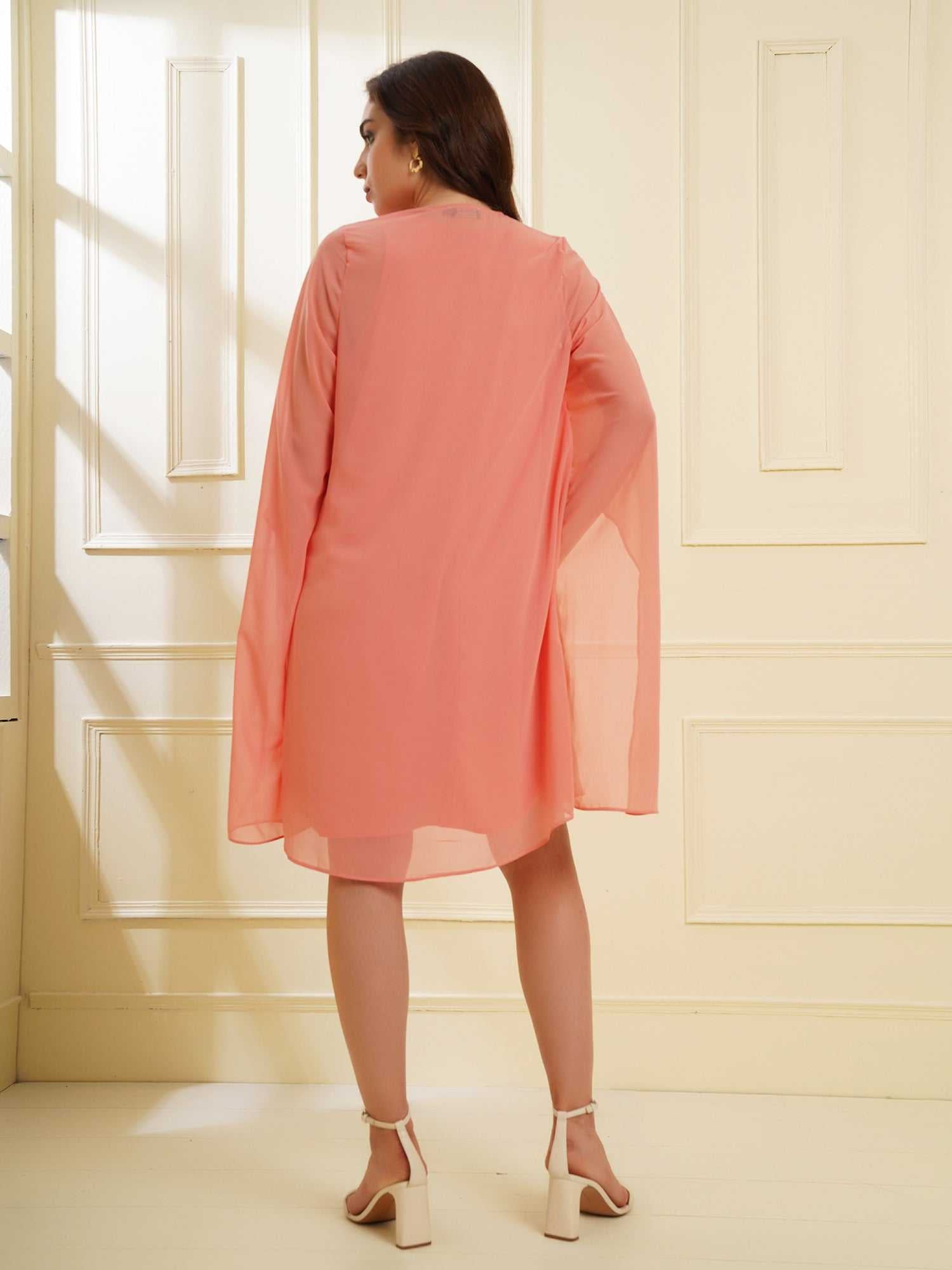 peach dress with placket embellishment