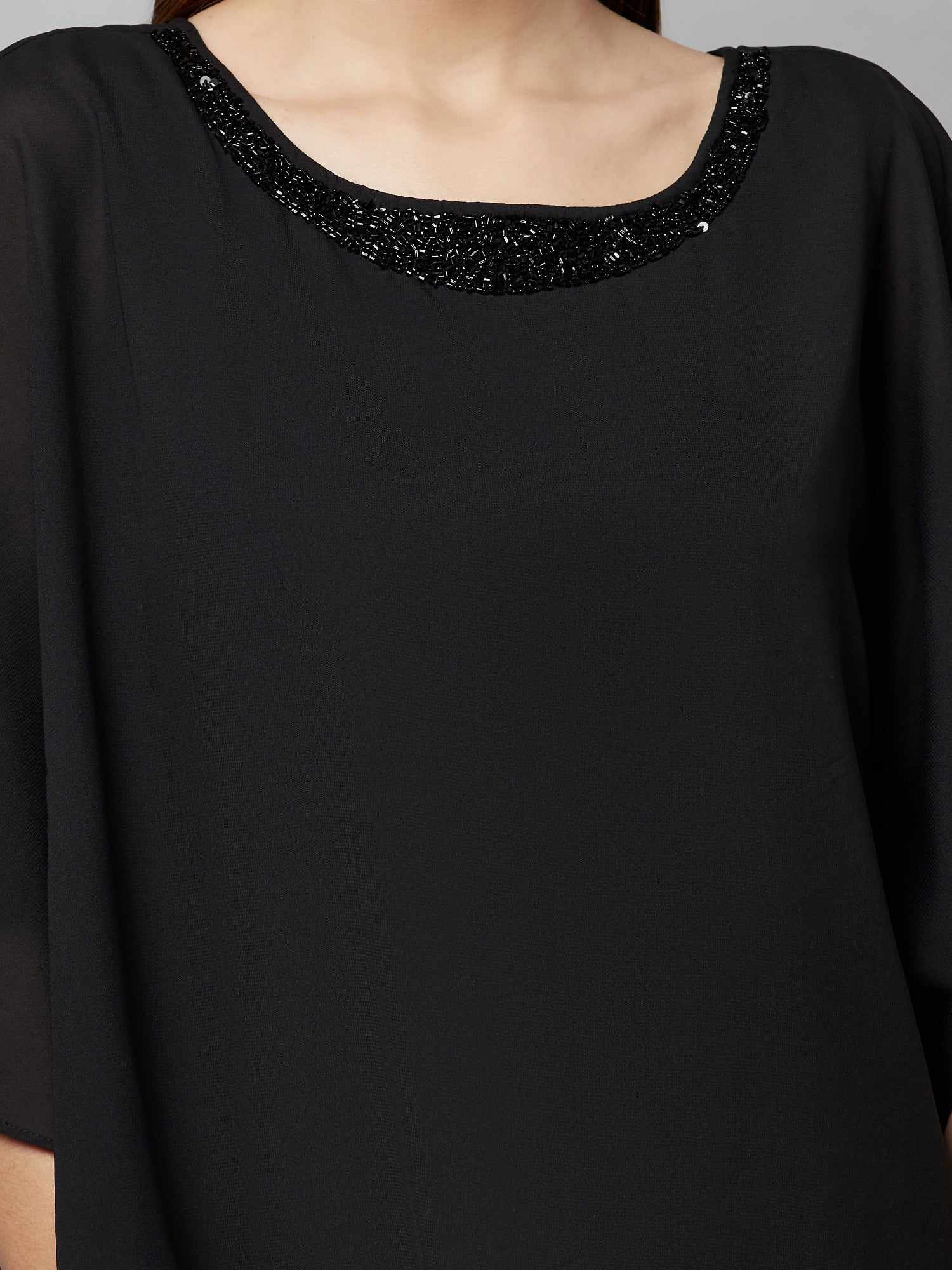 popover black dress with neck embellishment