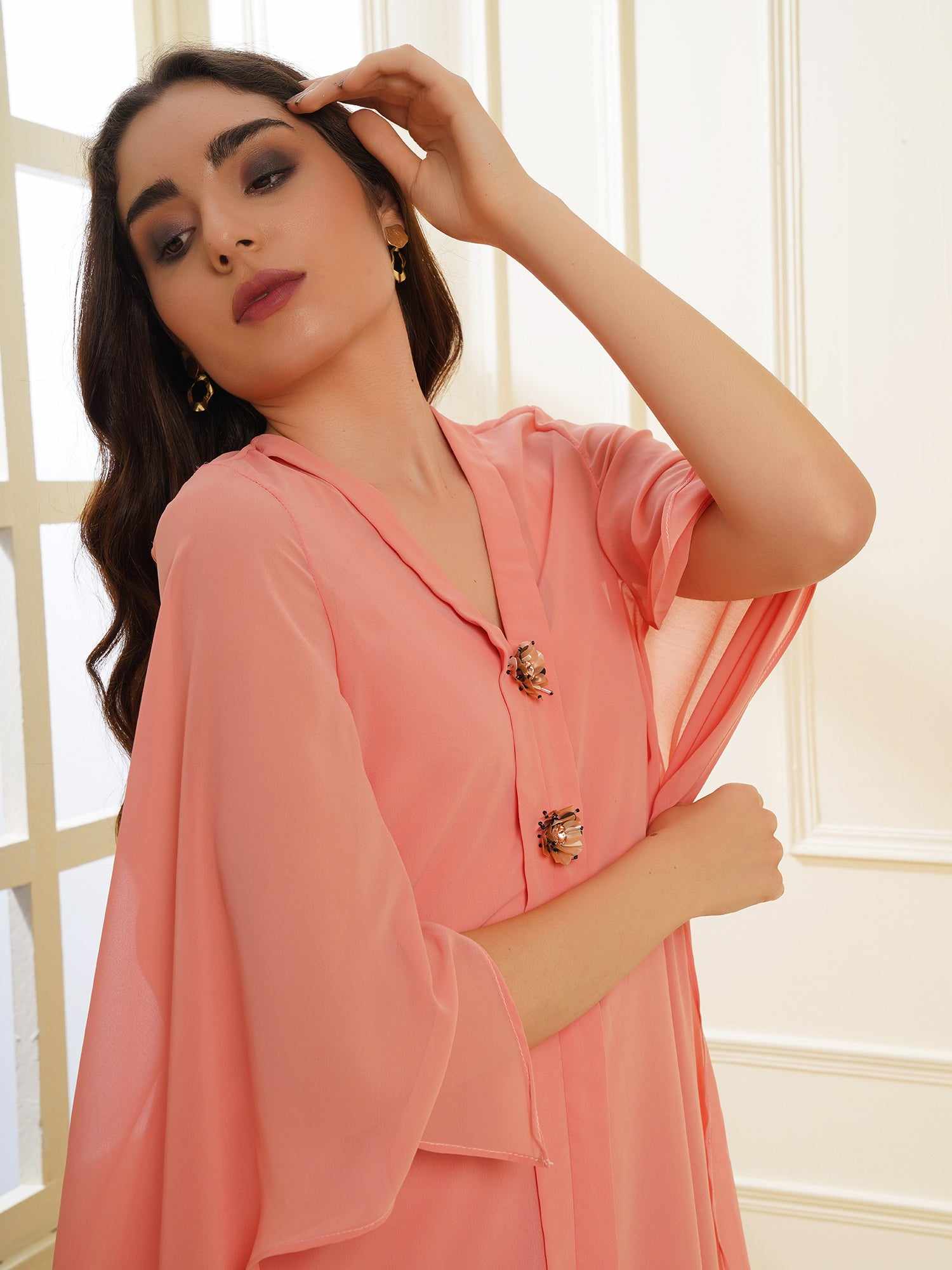 peach dress with placket embellishment