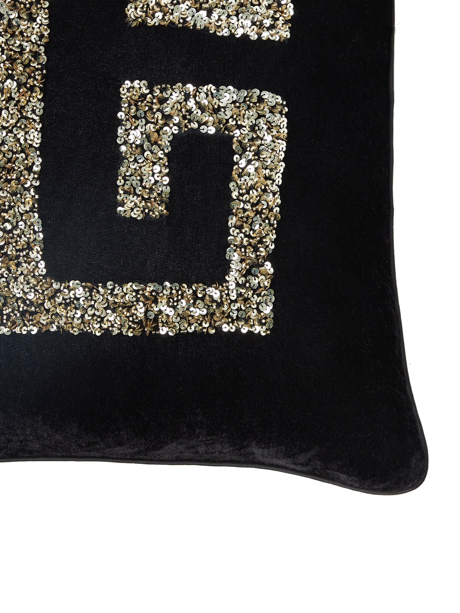black embellished cushion